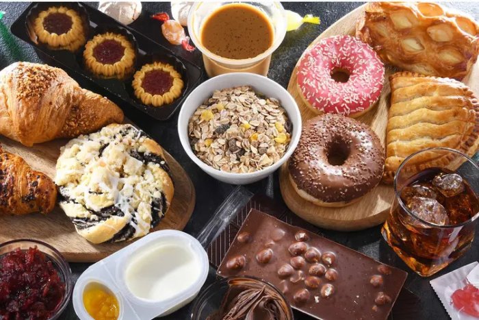 Assortment of sugary and sticky foods that can contribute to tooth decay